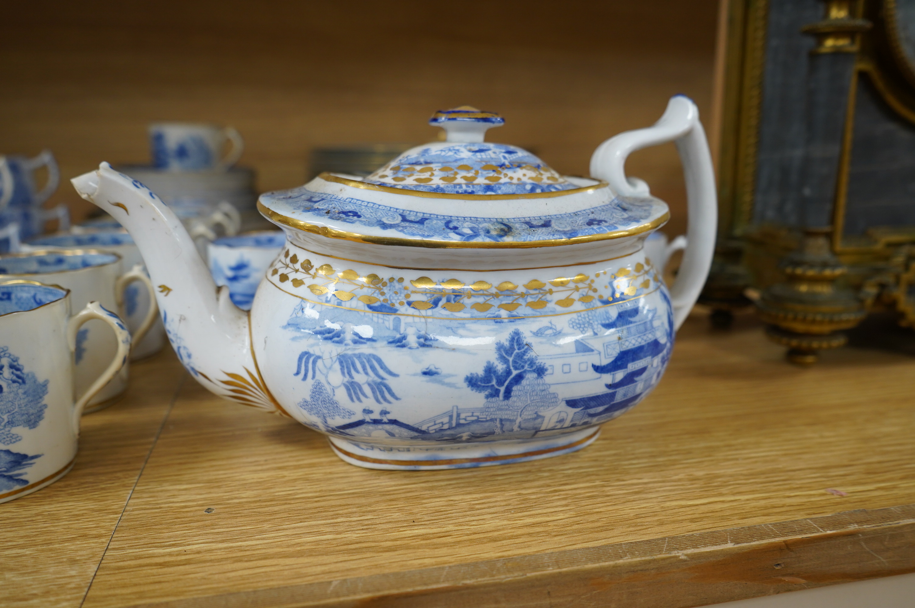 An early 19th century part coffee and tea set, probably Miles Mason, and a set of ten Derby dessert plates, 25cm in diameter. Condition - varies, poor to good